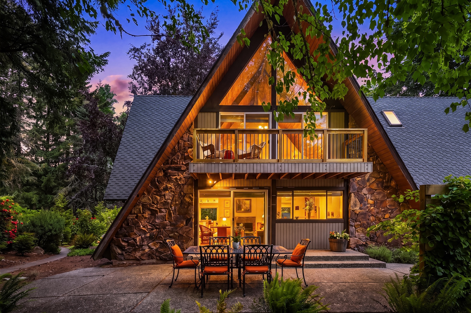 Rear A-frame and patio at twilight